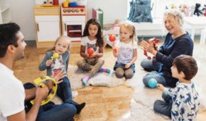 Young children and teacher being observed in class
