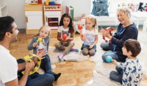 Young children and teacher being observed in class